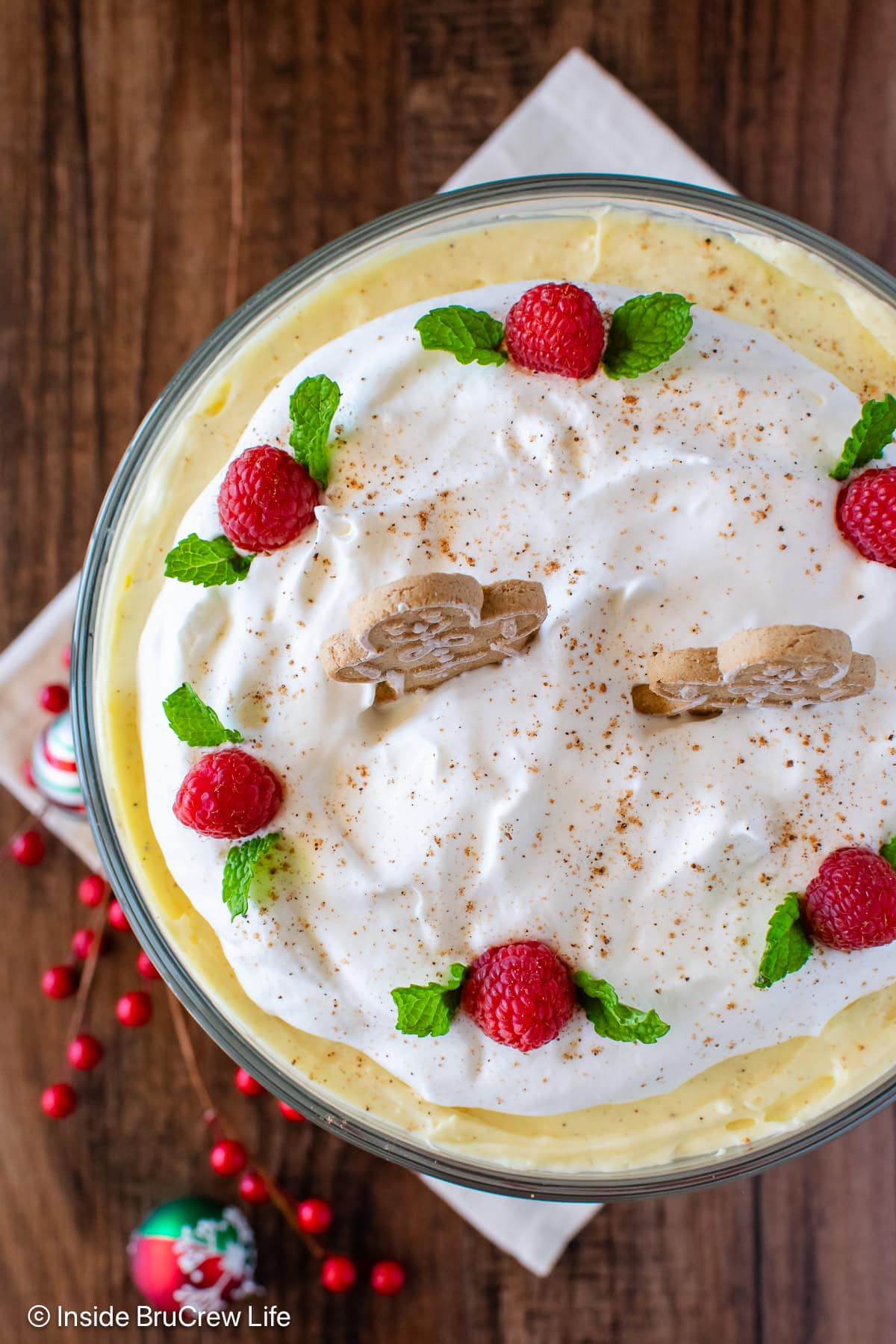 The fluffy topping of a dessert trifle dish.