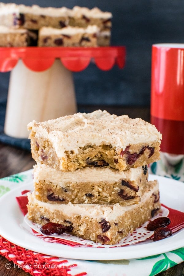 Frosted Cranberry Apple Butter Bars - these easy oatmeal bars are loaded with dried cranberries. Great recipe to change up your oatmeal bars!