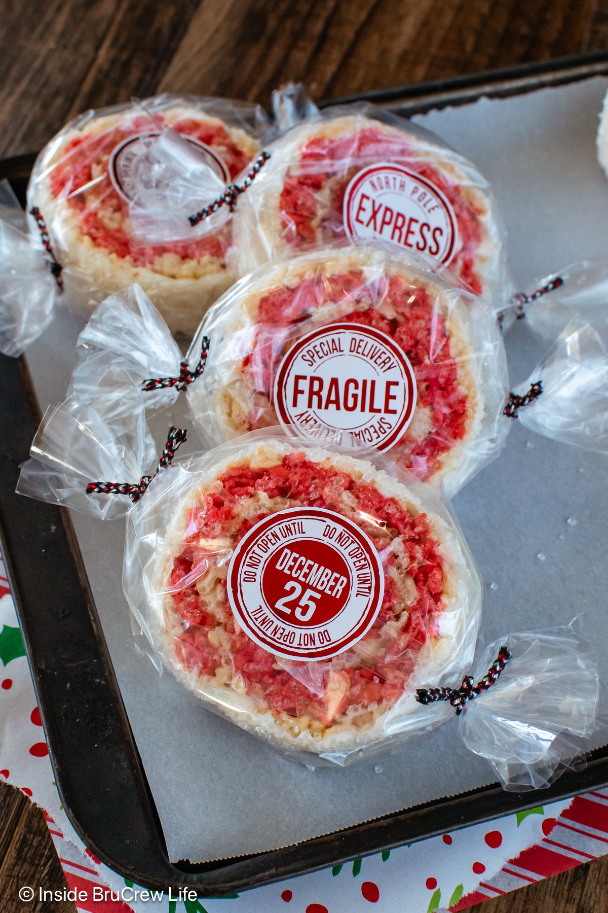 Peppermint pinwheels wrapped in plastic wrap.