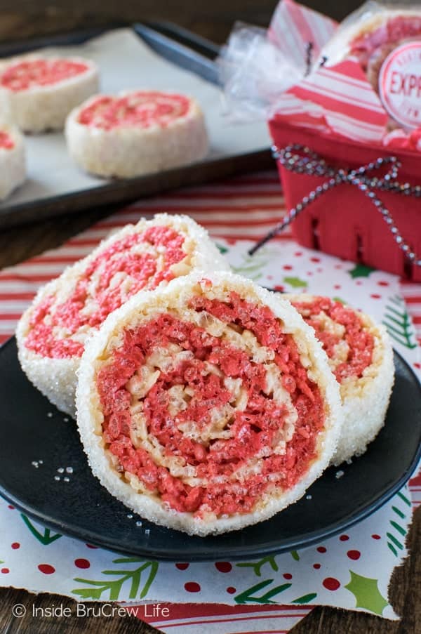 Peppermint Rice Krispies Pinwheels - these easy no bake red & white spiral treats with a white chocolate sugar coating is a fun and easy recipe for holiday parties. This was created in partnership with Rice Krispies. #ad