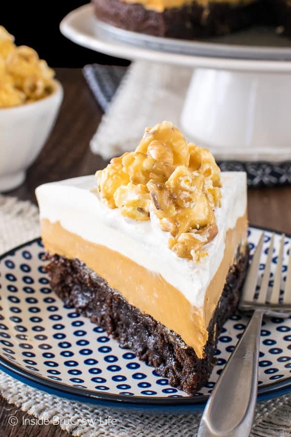 White Chocolate Caramel Mousse Brownie Cake - two layers of no bake mousse add a sweet touch to this easy fudgy brownie cake. Great dessert recipe for anytime!