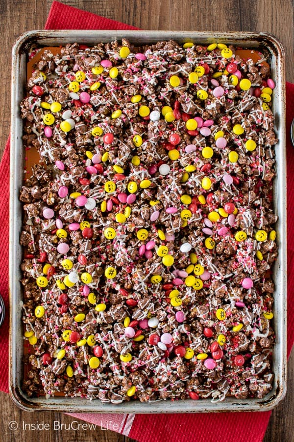 Sprinkles and candies make this Dark Chocolate M&M's Popcorn a fun snack mix to share! Easy recipe for game days or movie nights!