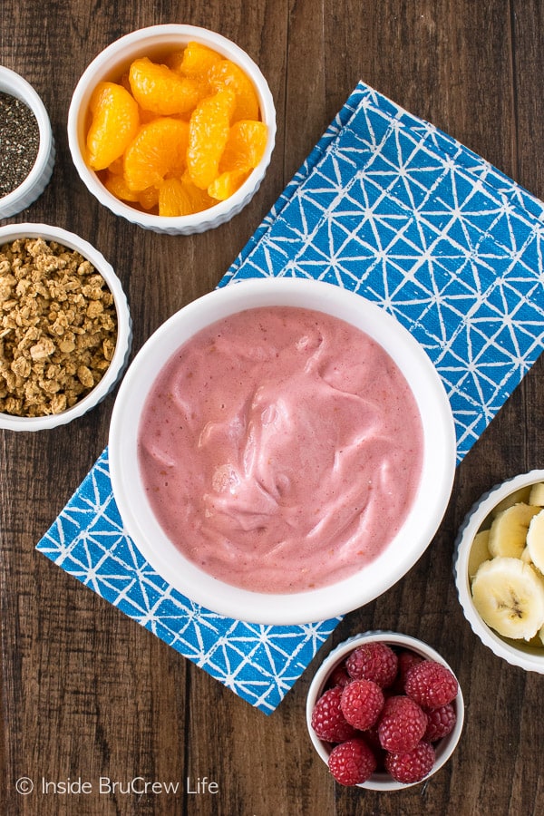 Raspberry Orange Frozen Yogurt Bowls - easy healthy yogurt recipe made from frozen fruit. Add toppings for a fun treat!