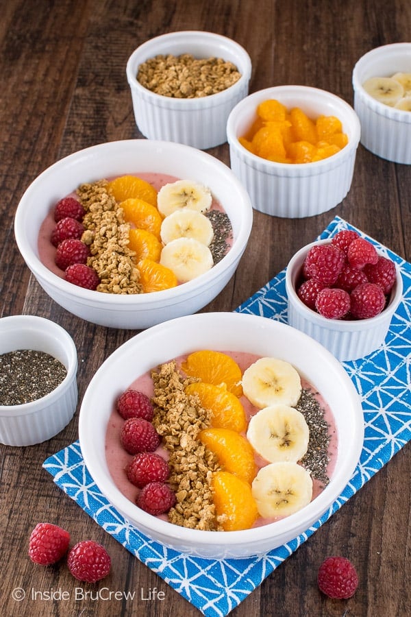 Add your favorite fruit and granola to the tops of these Raspberry Orange Frozen Yogurt Smoothie Bowls for a healthy snack.