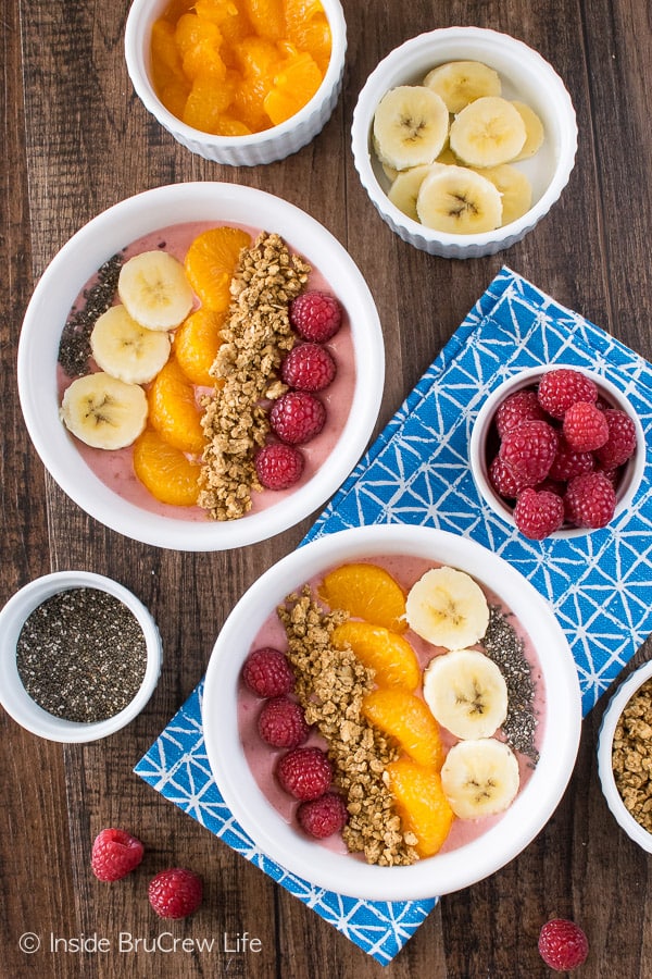 Add fresh fruit and granola to these easy Raspberry Orange Frozen Yogurt Bowls for a healthy snack.