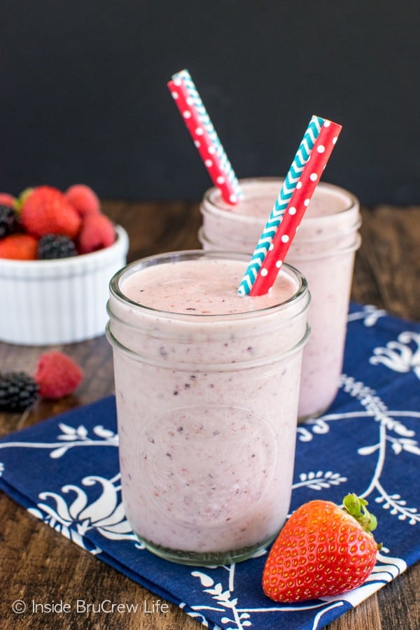Triple Berry Orange Smoothie - this easy & healthy smoothie is full of fruit, yogurt, and protein powder. Great way to start out the day!