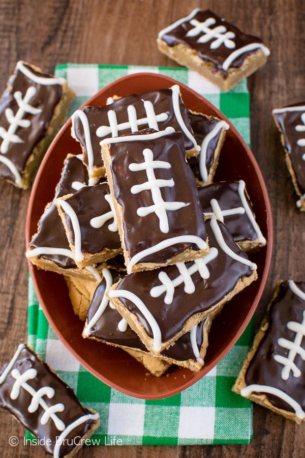 A football shaped bowl filled with football cookie bars