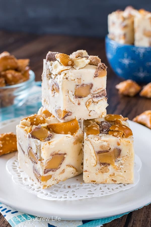 Caramel Peanut Butter Pretzel Fudge - swirls of crunchy pretzels and chewy candy bars add a fun flair to this creamy fudge recipe! Easy no bake dessert that is ready in minutes!