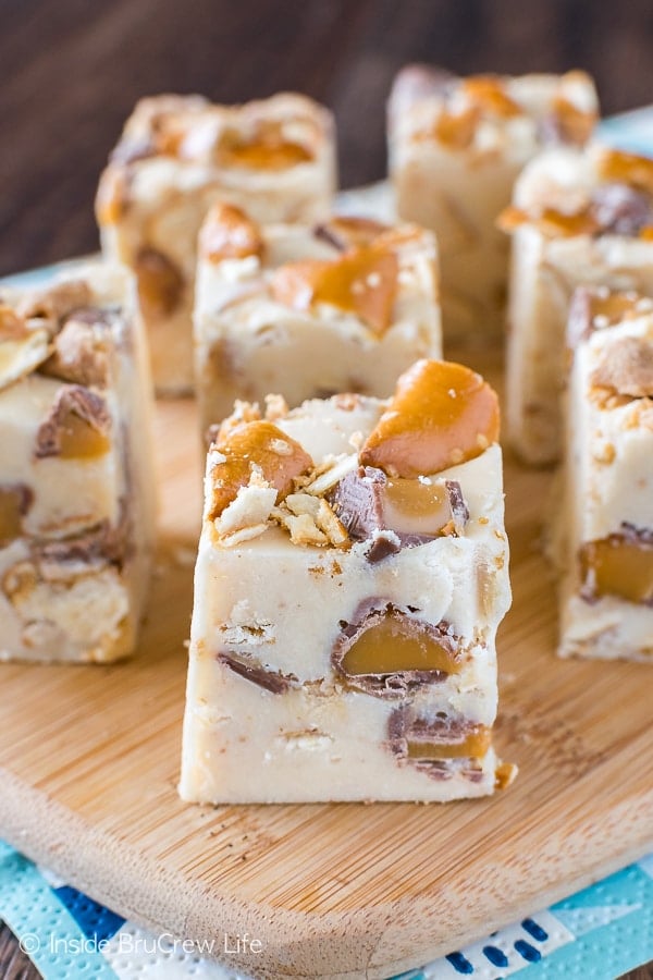 Caramel Peanut Butter Pretzel Fudge - creamy fudge loaded with pretzels and candy bars. Great no bake dessert recipe that is ready in minutes!