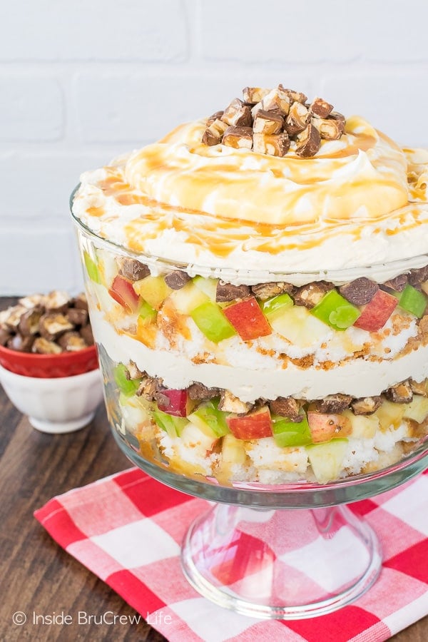 Apple Snickers Cheesecake Trifle - candy bars, apples, cake, and cheesecake make this no bake dessert recipe perfect for summer picnics or dinners!