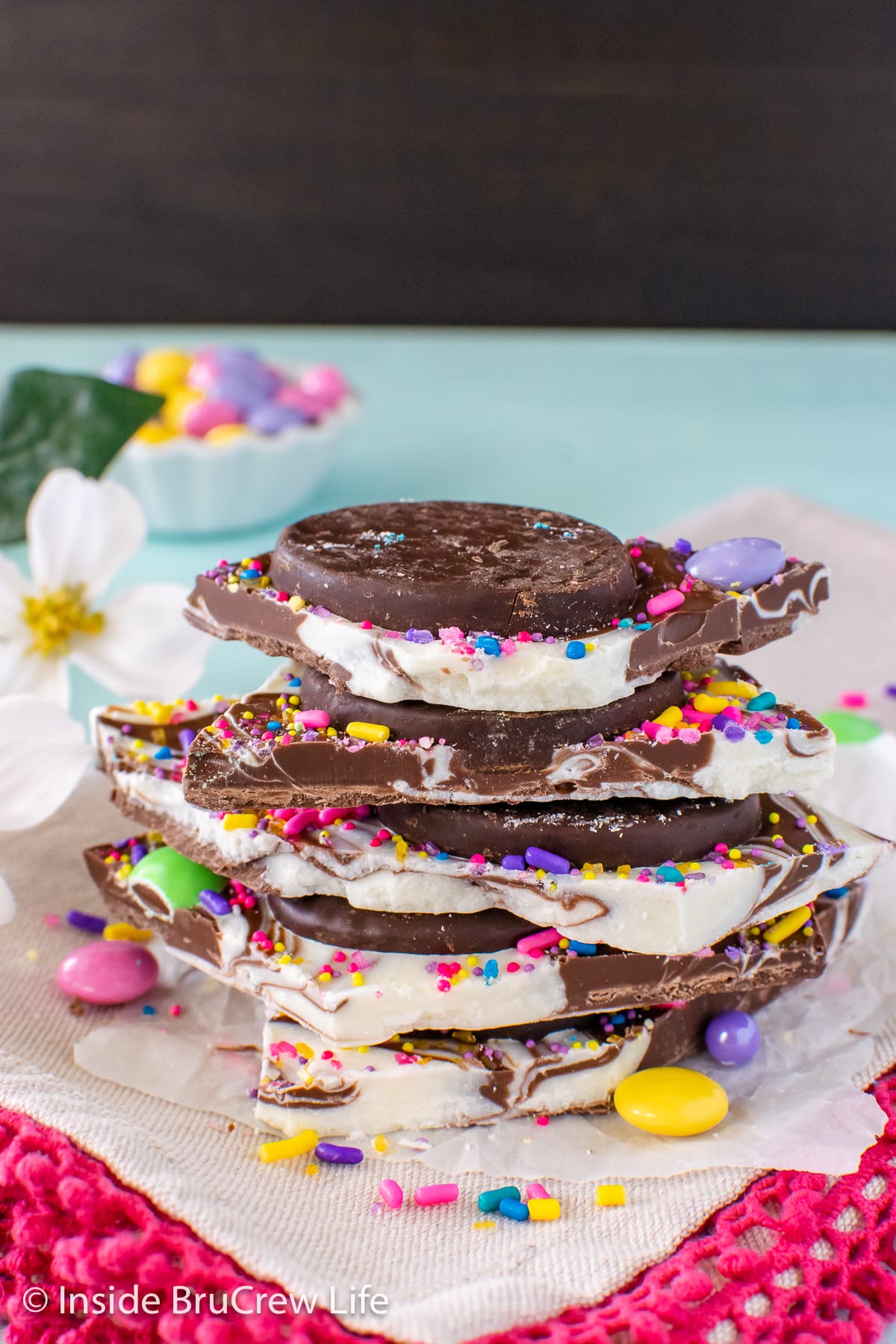A stack of chocolate Easter bark on a towel.