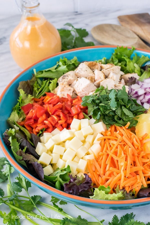 Pineapple Sriracha Chicken Salad - fresh veggies and a sweet and spicy homemade dressing make this salad recipe a hit for hot summer months!