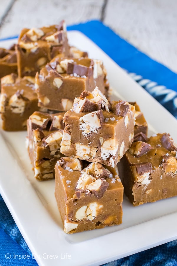 Salted Caramel Snickers Fudge - adding candy bars and sea salt gives this easy fudge a fun twist! Great recipe for your sweet and salty cravings!