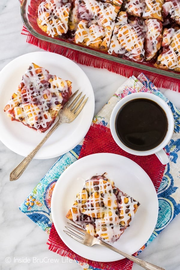 Strawberry Chocolate Cinnamon Roll Bake - pockets of strawberry pie filling in this soft cinnamon roll bake makes a delicious breakfast. Great recipe for busy mornings!