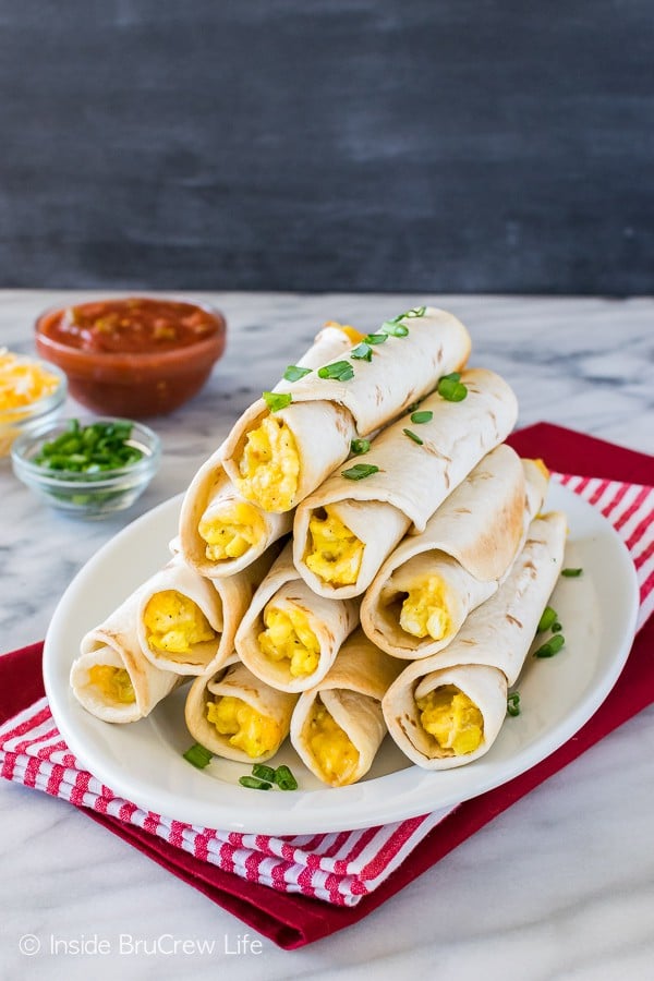 Green Chile Egg Taquitos - cheesy eggs and green chiles makes a great grab and go breakfast recipe.