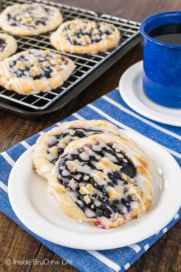 Homemade Blueberry Lemon Danish - blueberry pie filling and lemon drizzles makes these easy breakfasts disappear in a hurry! Great recipe to make for weekend brunches!