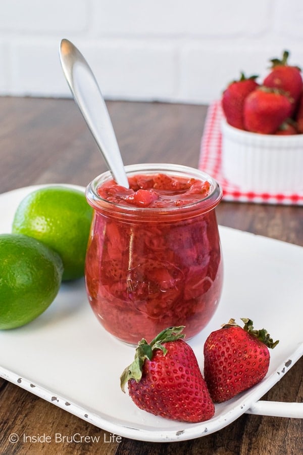 Honey Lime Strawberry Sauce - this easy fruit topping is made with a just a few ingredients. Great recipe to eat with cheesecake, toast, or ice cream!