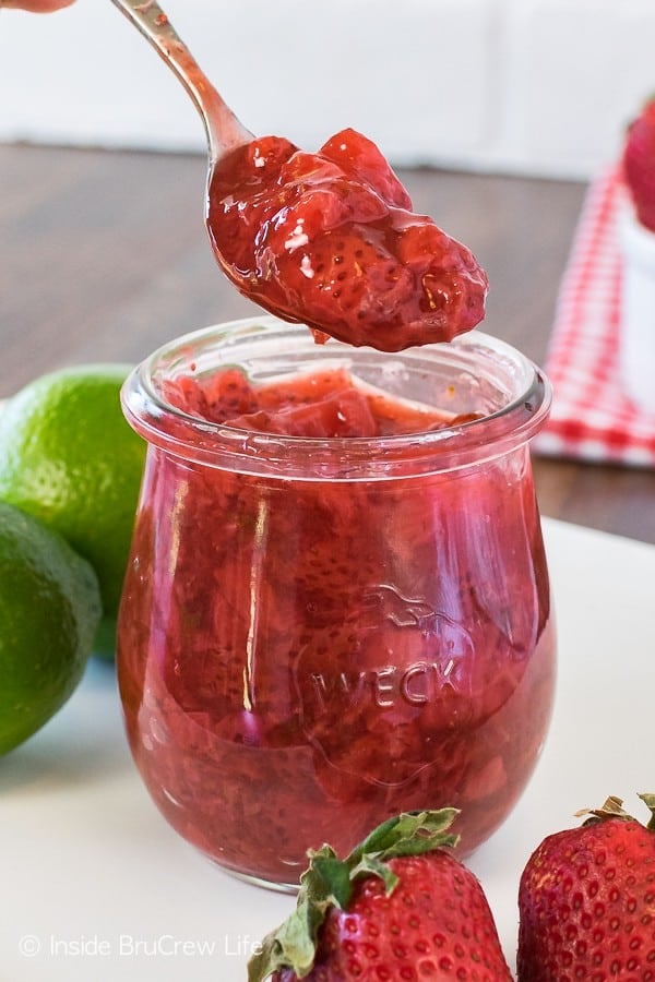 Honey Lime Strawberry Sauce - this fruit topping is made with just a few ingredients. Use it on cakes, cheesecake, ice cream, or toast. Easy recipe to use up those fresh berries!