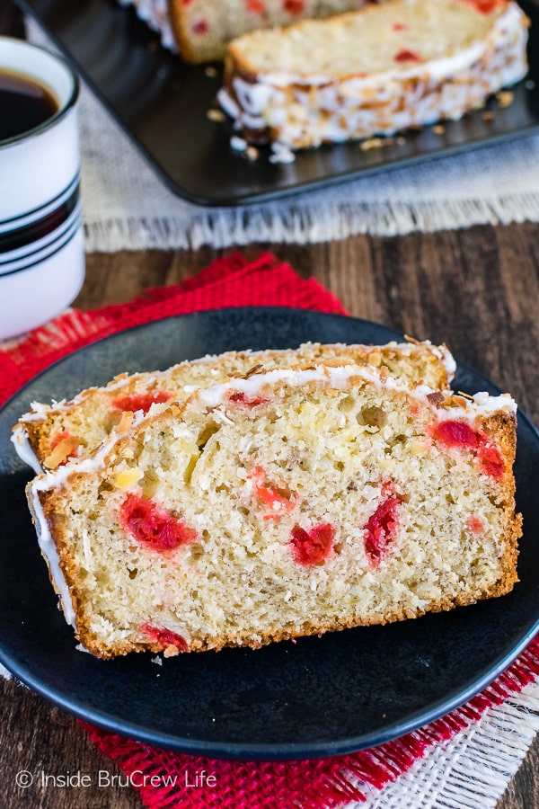 Close up pictures of slices of tropical banana bread on a black plate