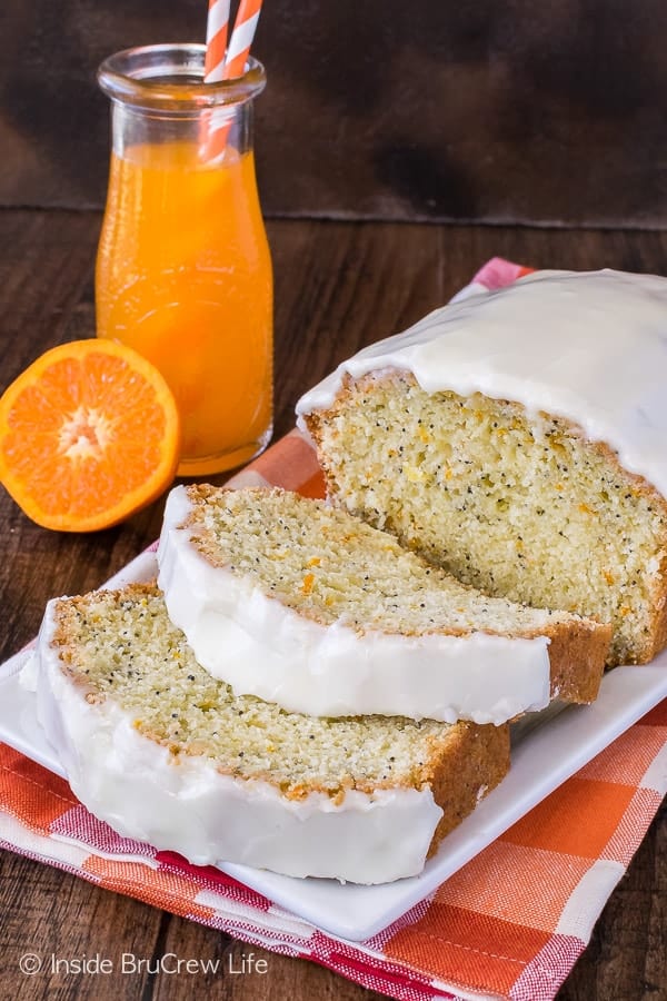 Frosted Orange Poppy Seed Bread - sweet orange bread with poppy seeds and a thick layer of frosting. Best sweet bread recipe for breakfast!