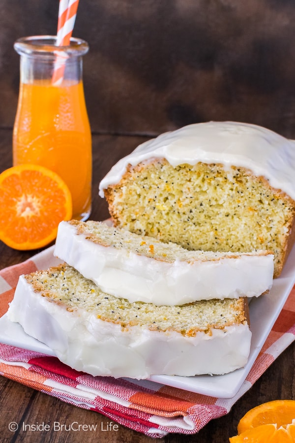 Frosted Orange Poppy Seed Bread - sweet frosting and poppy seeds a fun twist to this sweet orange bread! Great breakfast recipe!