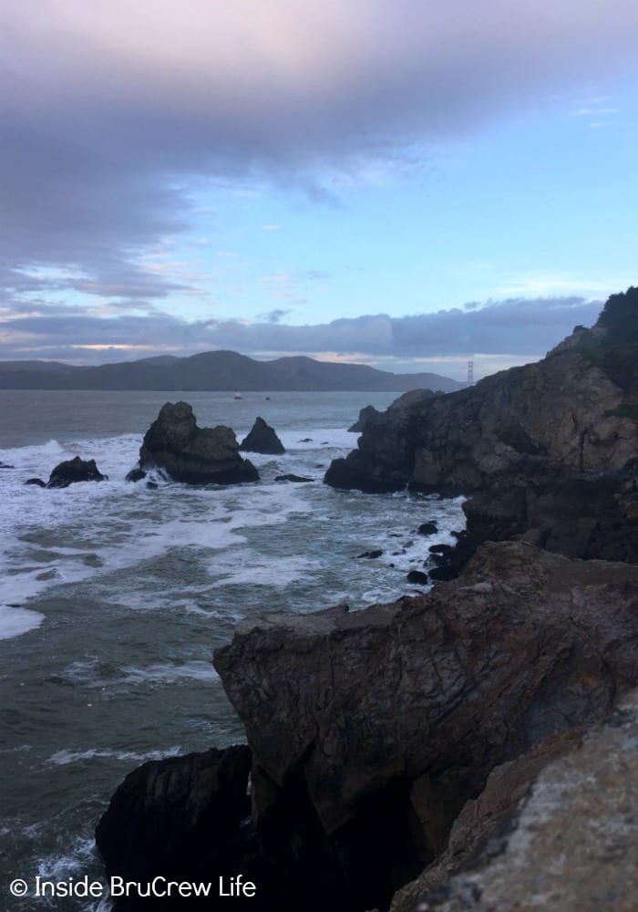 Seven Places to Visit in San Francisco - the trails and rocks at Lands End is a great place to watch the sun set over the bay in San Francisco.