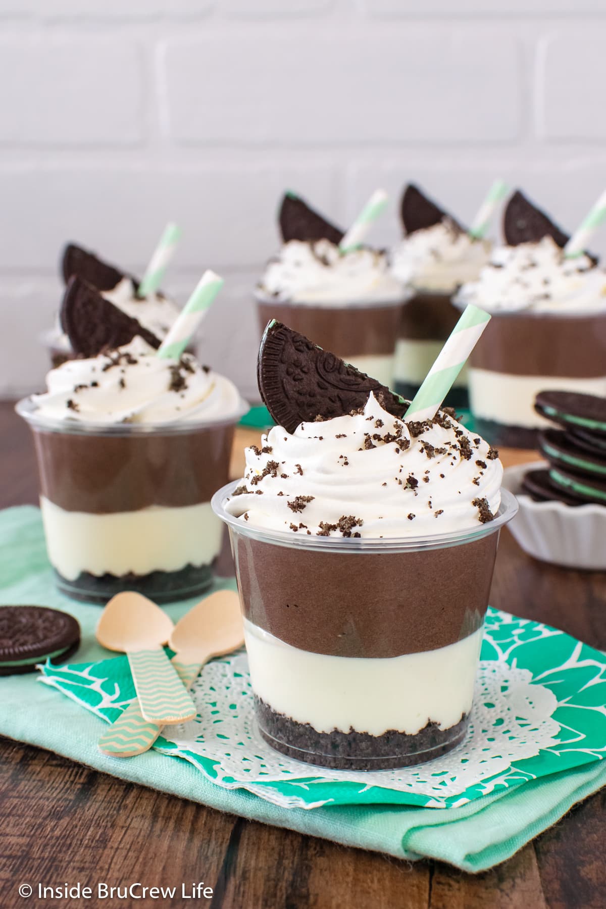 Little dessert cups filled with two layers of cheesecake filling.