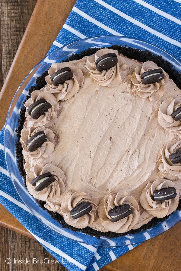No Bake Chocolate Cream Pie - three layers of creamy chocolate in a cookie crust. Perfect no bake recipe for summer!