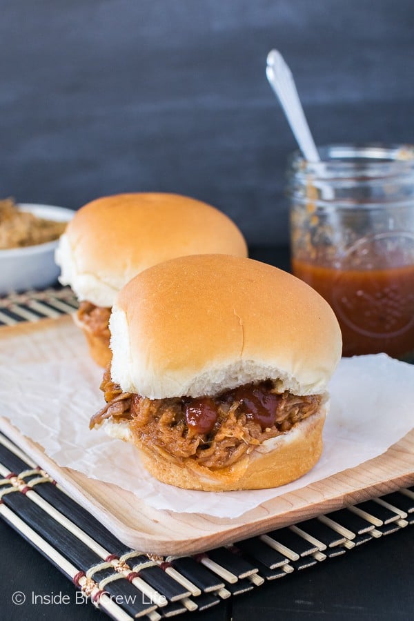 Easy Slow Cooker Pulled Pork - rub a pork tenderloin with seasonings and cook for 8 hours in a crock pot for the most tender and easy meal idea! Perfect recipe for summer picnics and parties!