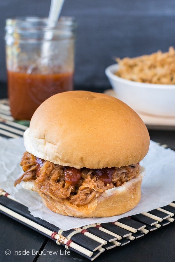 Easy Slow Cooker Pulled Pork - you only need two ingredients and eight hours to have a pot of tender pork for dinner! Easy recipe for summer meals!