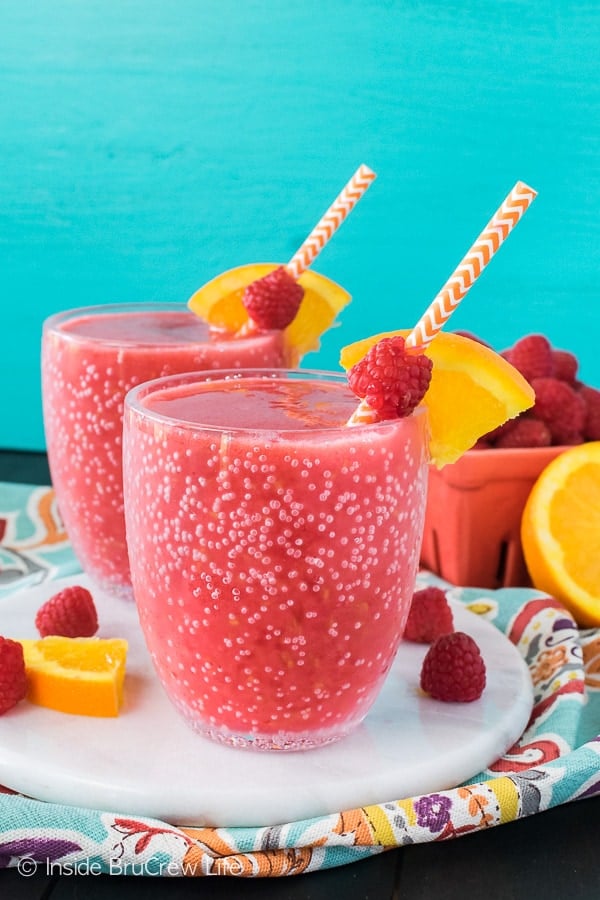 Raspberry Orange Slushies - use your blender to mix up this easy frozen drink. Fresh fruit, ice, and juice creates a refreshing summer recipe!