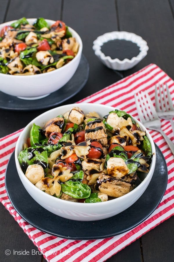 Spinach Chicken Caprese Salad - a big bowl of greens and chicken drizzled with homemade balsamic dressing is the perfect light dinner! Easy meal for those busy days!