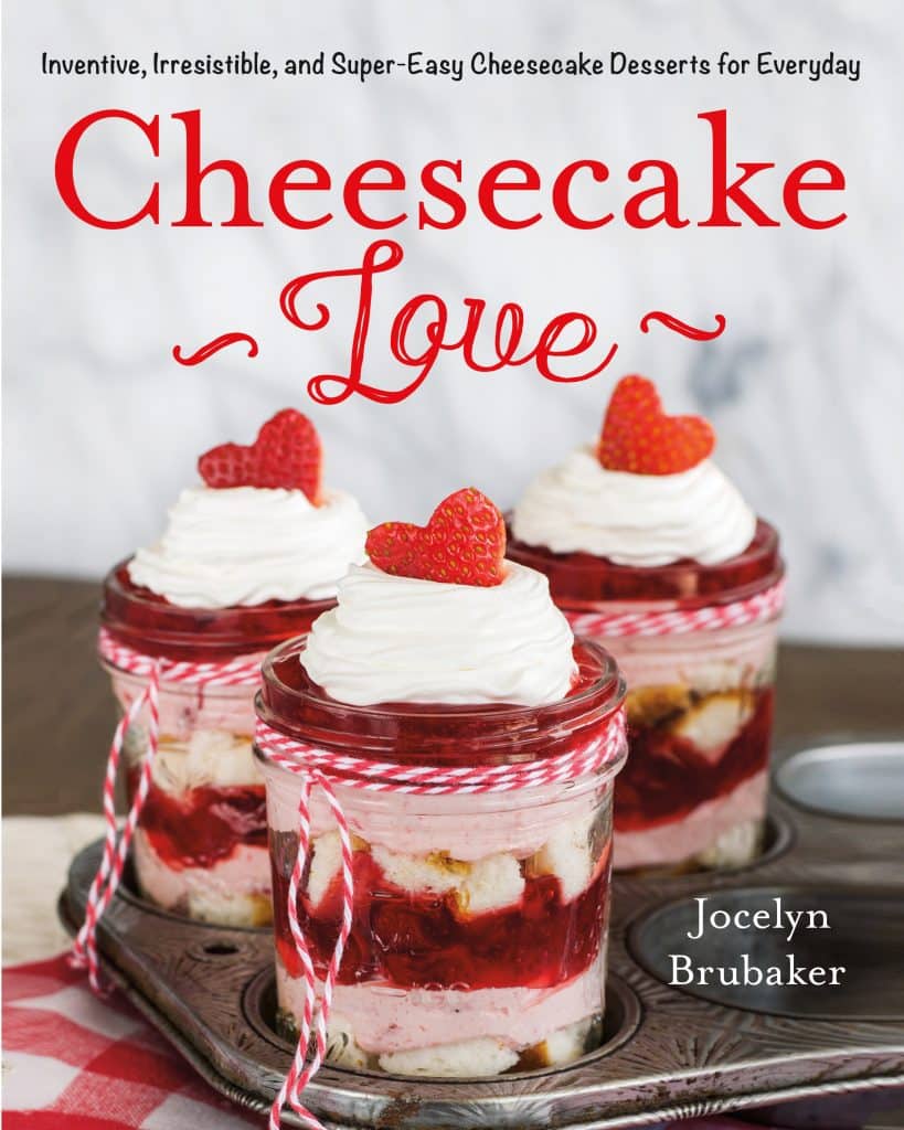 The cover picture of the Cheesecake Love cookbook.