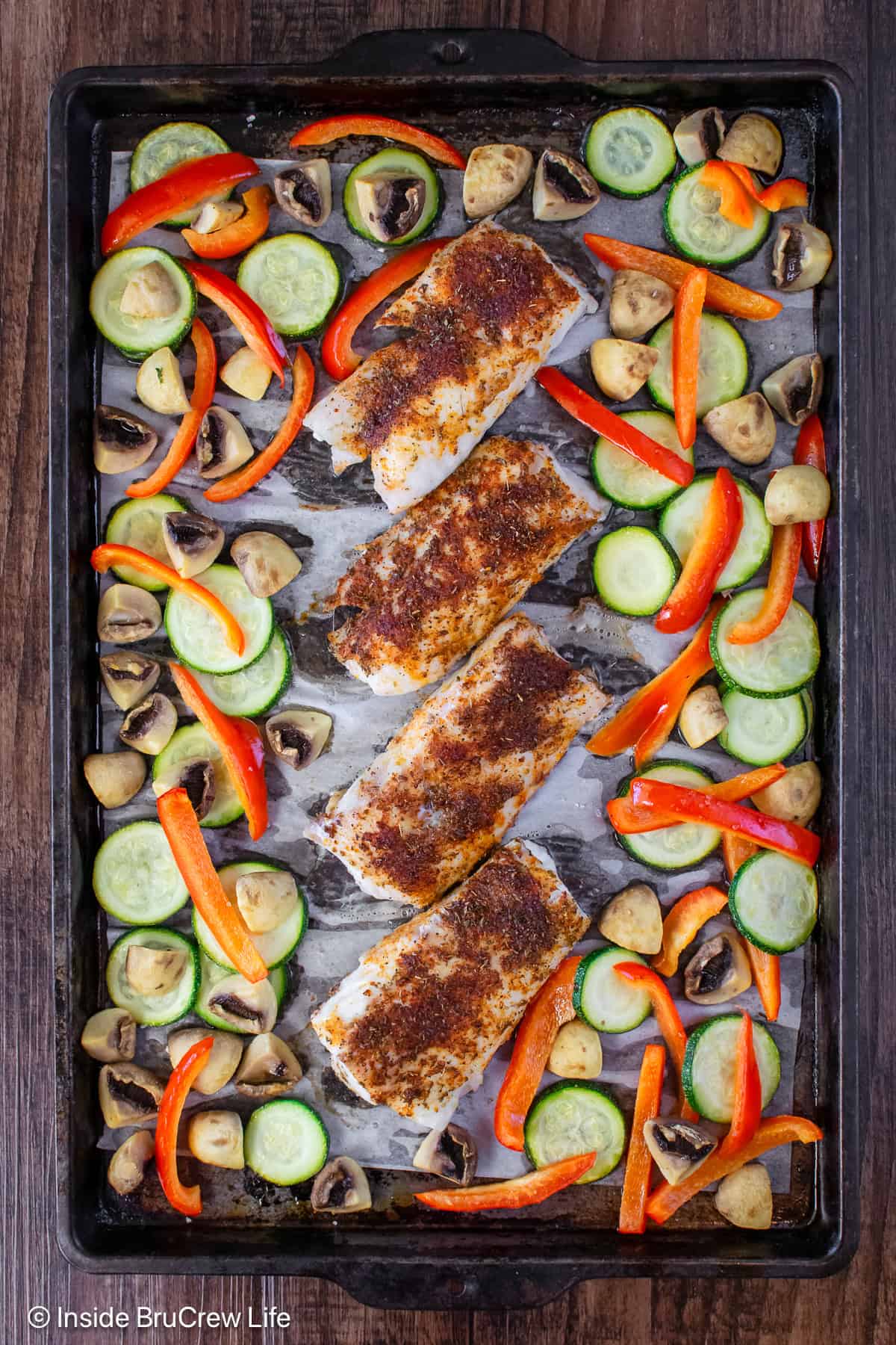 A sheet pan dinner with chili lime cod and roasted veggies.