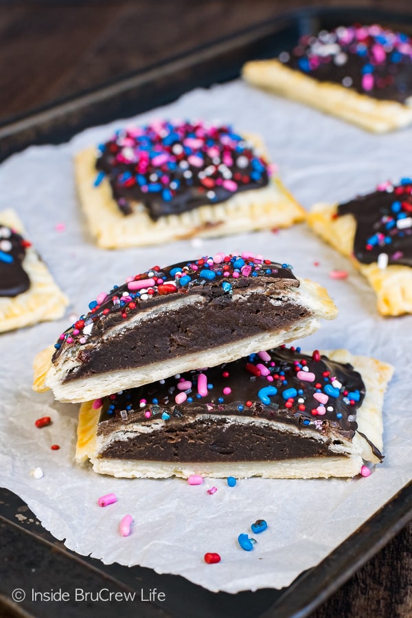 Brownie Cheesecake Breakfast Tarts - sweet brownie centers and chocolate frosting makes these a fun way to start the day. Easy breakfast recipe for busy mornings!