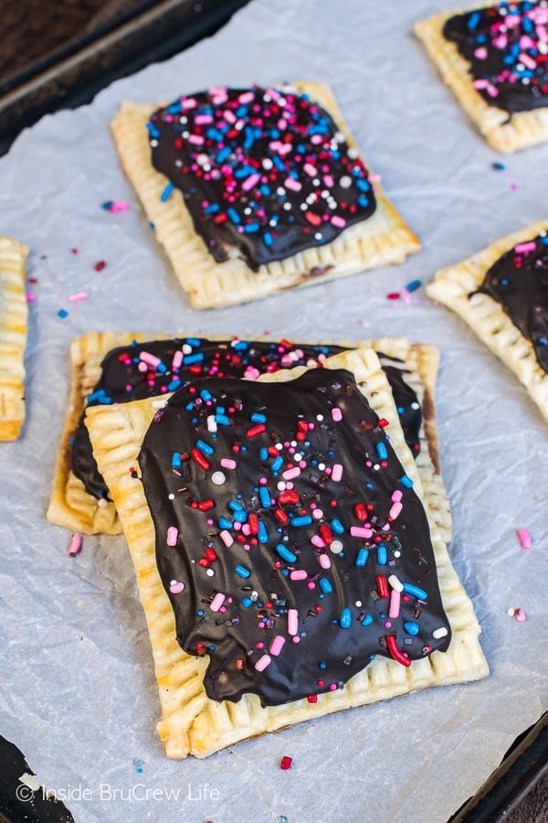 Brownie Cheesecake Breakfast Tarts - chocolate frosting and a brownie center makes these a favorite breakfast treat. Easy recipe for busy school mornings!