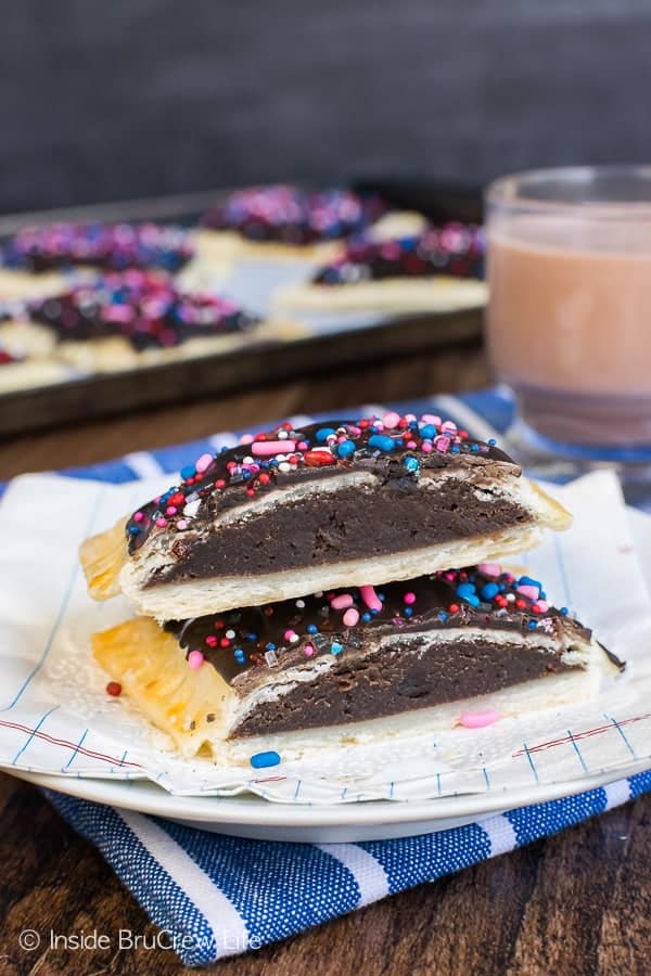 Brownie Cheesecake Breakfast Tarts - a sweet brownie center and chocolate frosting makes these tarts so fun. Easy breakfast recipe for busy mornings!
