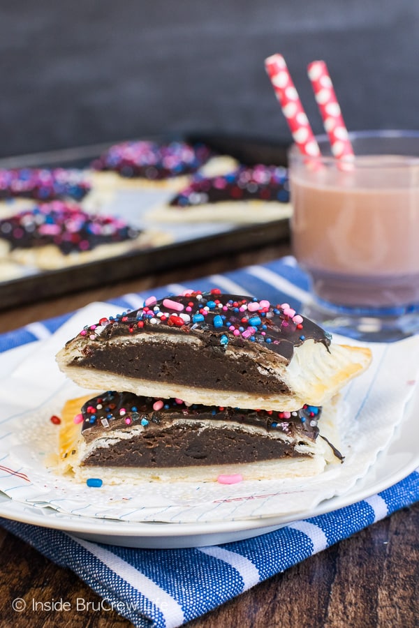 Brownie Cheesecake Breakfast Tarts - a soft brownie center and chocolate frosting makes these tarts a fun breakfast treat. Easy recipe for busy mornings!