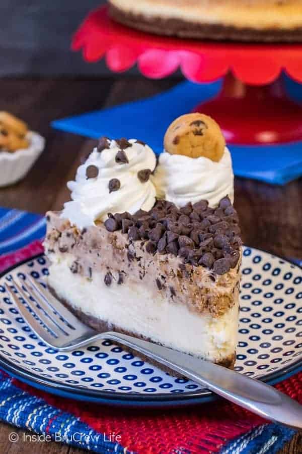 Chocolate Chip Cookie Mousse Cheesecake - layers of creamy cheesecake, chocolate chip cookie mousse, and chocolate chips makes this a must make cheesecake recipe. Perfect dessert to end any meal!