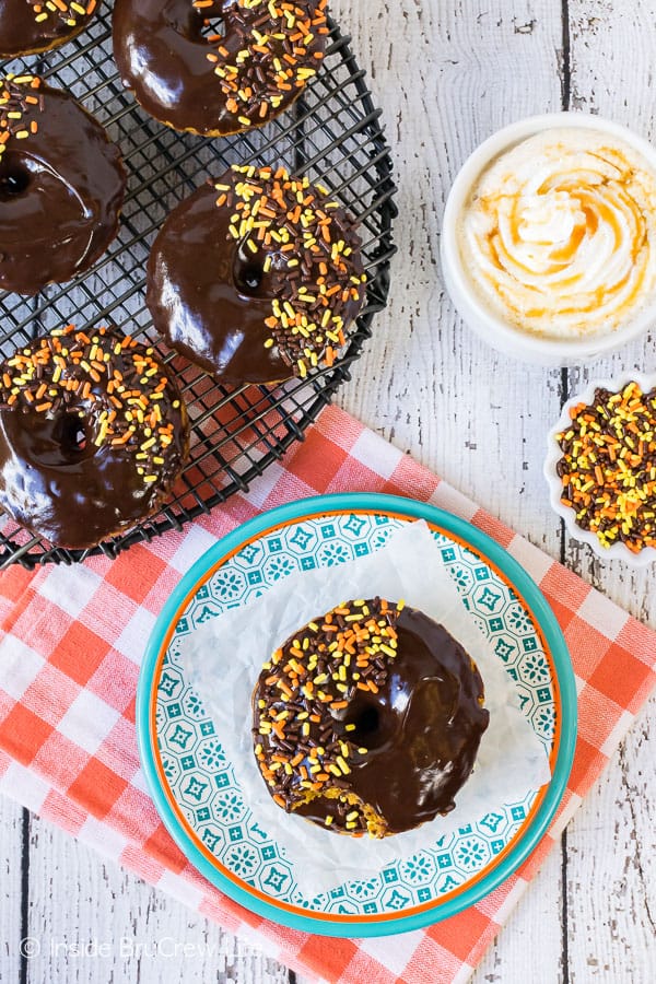 Chocolate Chip Pumpkin Donuts - these soft pumpkin donuts are loaded with chocolate goodness inside and on top! Great fall recipe for breakfast!