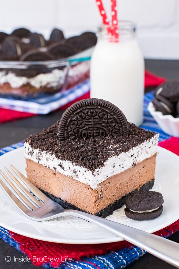 Chocolate Cookies and Cream Cheesecake Bars - creamy chocolate cheesecake with a cookies and cream mousse topping. Great cheesecake recipe that everyone will love!
