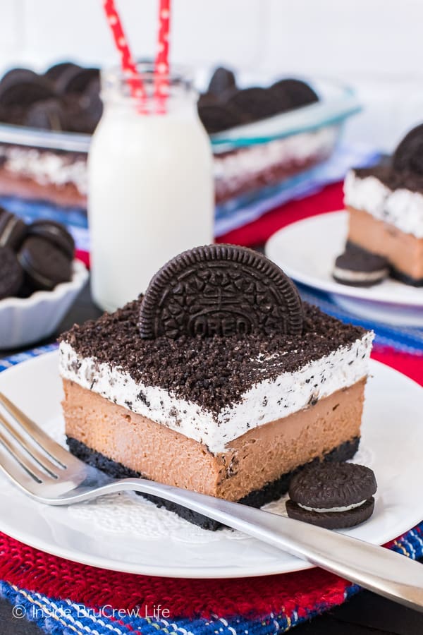 Chocolate Cookies and Cream Cheesecake Bars - creamy chocolate cheesecake and a cookies and cream mousse make this recipe disappear in a hurry