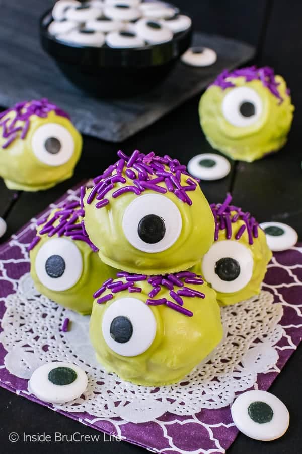 Peanut Butter Monsters - big candy eyes and purple hair make these easy no bake treats a fun and easy recipe to make for halloween parties!