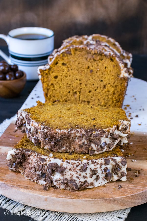 Pumpkin Spice Latte Bread - a soft sweet pumpkin bread topped with a coffee glaze and chocolate covered coffee beans is a must make recipe for fall.