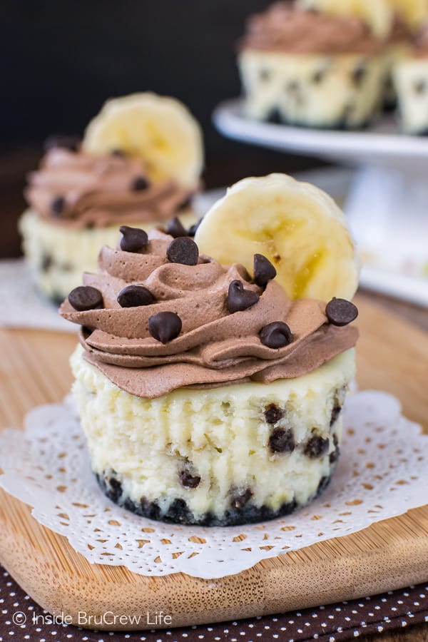 Banana Chocolate Chip Cheesecakes - mini banana cheesecakes loaded with chocolate and topped with homemade chocolate whipped cream makes a fabulous dessert. Great recipe for parties.