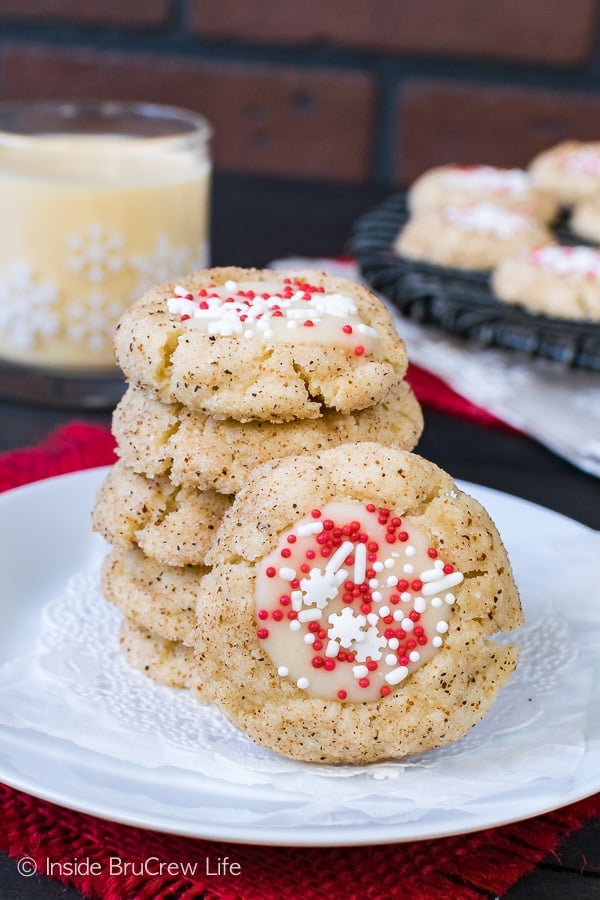 A white plate with Eggnog Thumbprints stacked together.