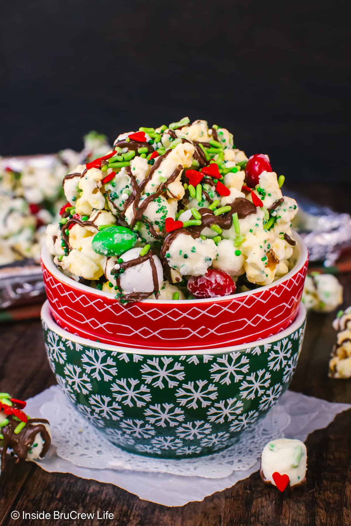 Two stacked bowls filled with a mint Grinch popcorn.