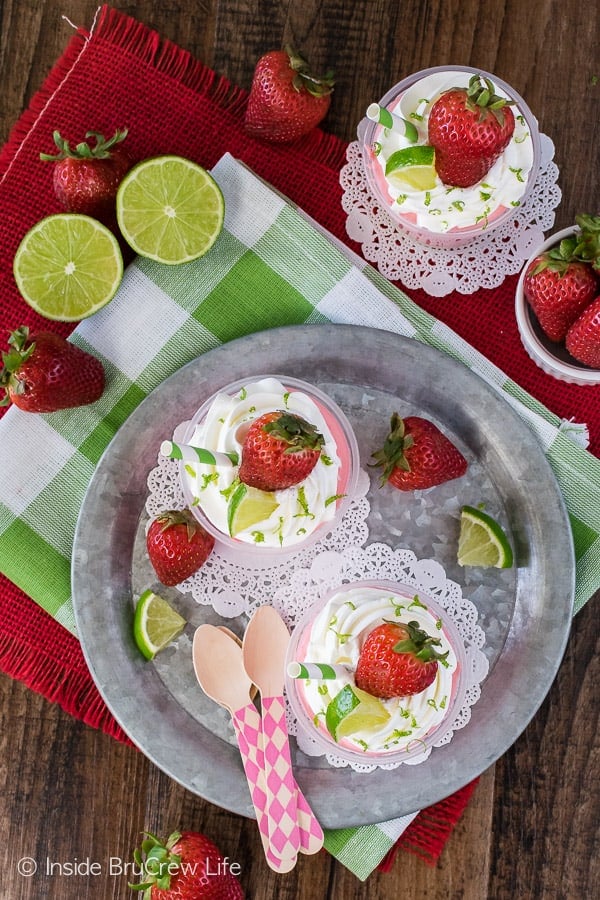 An overhead picture of a metal pan with a strawberry dessert on it.