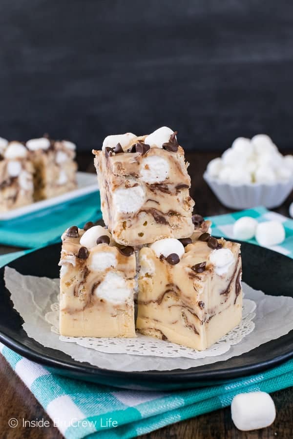 Peanut Butter Avalanche Fudge - sweet peanut butter fudge loaded with pockets of marshmallow, cereal, and chocolate. This no bake fudge recipe will become a favorite quickly!