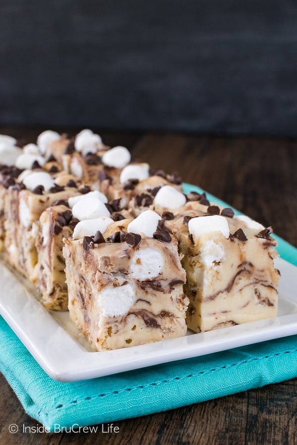Peanut Butter Avalanche Fudge - soft marshmallows, crunchy cereal, and chocolate chips add a fun texture to this creamy peanut butter fudge. Easy recipe to make for parties!